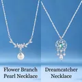 Elegant silver necklace set featuring pearl floral branch and intricate dreamcatcher pendants - Flower Branch Pearl And Dreamcatcher