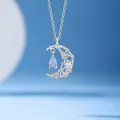 Dromerige ster en maan ketting met blauwe waterdruppel hanger in zilveren afwerking. - Eenvoudige Verpakking / Enkele Verpakking / Drijvend Water Maan Stijl