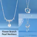 Elegant silver flower branch pearl necklace with butterfly design and blue stones - Floral Branch Pearl and Butterfly and Fanghua