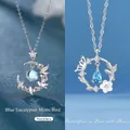 Dromerige zilverkleurige halskettingen met vogel- en vlindermotieven en blauwe stenen - 2-delige set (Vogel+Vlinder) / Eenvoudige Verpakking / Zilver