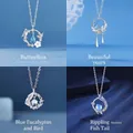 Elegante zilveren halskettingen met bloemen-, vlinder- en vissenstaarthangers met blauw. - 4-delige set (Vlinder+Blad+Vogel+Visstaart) / Eenvoudige Verpakking / Zilver