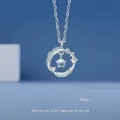Elegant silver necklace with circular feather pendant and iridescent center stone - Feather Circle Style