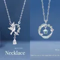 Elegant silver bird floral wreath pendant and feather circle necklace for women - Blue Gum and Bird And Feather Companion