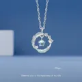 Elegante zilveren ketting met een veren cirkelhanger en een blauwe edelsteen - Aan jouw zijde