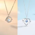 Elegant heart and flower pendant necklaces with sparkling blue stones in silver and gold - Eucalyptus and Wild Joy