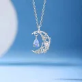 Dromerige zilveren ketting met ster en maan en een peervormige edelsteen hanger - Drijvend Water Maan Stijl