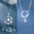 Zilveren halsketting met maan-, vogel- en sterhangers en blauwe kristallen - Eenvoudige Verpakking / 2-delige set / Blauwe Eucalyptus Vogel + Sterrenrivier Stijl