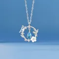 Elegante zilveren ketting met delicate vlinder en blauwe druppelvormige bloem hanger ontwerp - Vlinder-bloem stijl