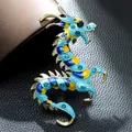 Detailed view of a vibrant enamel dragon brooch with intricate blue rhinestone details - Zodiac Dragon Shape (AL751580888954) / Blue