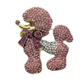 Macro detail showing the intricate pink and white rhinestone pavé on a poodle brooch. - Pink