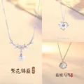 Elegant silver-toned floral necklace with pearl and blue gemstone accents for women - Clusters of Flowers, Bursting Joy & Blue Eucalyptus and Bird
