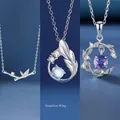 Set of three elegant silver necklaces featuring bamboo, guardian wing, and floral wreath pendants - Three-Piece Set / Bamboo Plenty + Guardian Wings + Vine Love