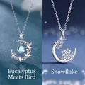 Halssnoer met halve maan, vogels en sneeuwvlokken, zilverkleurig sieraad. - Eenvoudige Verpakking / 2-delige set / Blauwe Eucalyptus Vogel & Sneeuwvlok