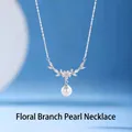 Elegant floral branch necklace in silver finish featuring a white pearl pendant for women - Flower Branch Pearl