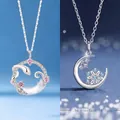 Elegant silver crescent moon necklaces featuring snake and snowflake crystal pendants - Snake Moon And Snowflake