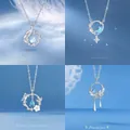 Elegante zilveren kettingen met blauwe kristallen en maanvormige hangers voor dames - Blauwe Eucalyptus + Dromenjager + Vlinderliefde + Geurset (4-delige set)