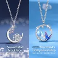 Silver necklace variants featuring moon snowflake and mermaid tail moonstone pendants - Snowflake & Inseparable