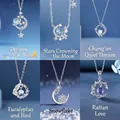 Dromerige zilverkleurige hemelse kettingset met maan, ster en sneeuwvlok hangers. - Dromerig, Sterren, Changan, Blauwe Vogel, Sneeuwvlok & Rank Combinatie