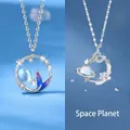 Elegant silver-plated moonstone necklace with mermaid and planet pendant designs. - Mermaid Tail And Universe Planet