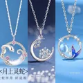 Elegant silver necklaces with moon snake, snowflake, and mermaid tail variant designs. - Moon Serpent, Snowflake & Inseparable