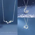 Minimalist silver necklace collection featuring bamboo, moon, and cosmic designs - Bountiful Bamboo, Snowflake & Cosmic Planets