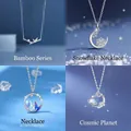 Elegant silver-toned pendant necklace featuring celestial, mermaid and nature motifs - Bountiful Bamboo, Snowflake, Inseparable & Cosmic Planets