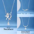 Elegant silver necklace set with bird, bamboo branch and pearl pendants - Bird Bamboo and Floral Pearl Set