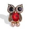Vintage uil broche in antiek goud met rood kristal en prachtige roze parelmoer details - Stijl 17