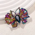 Elegante spilla a farfalla colorata con cristalli iridescenti e pietra blu a goccia - Stile Farfalla Iridescente (AL810142760937)