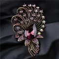 Luxurious vintage palace style brooch with teardrop purple crystal on black satin. - Purple