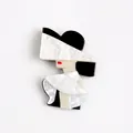 Modern acrylic brooch featuring a chic woman in a hat with elegant pearlescent finish - Black and White