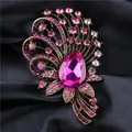 Luxurious court style crystal brooch with a large pink teardrop gem on black silk - Pink