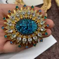 Vintage gold sunburst brooch with large blue crackle stone and clear rhinestones - Starburst Sapphire Style (2)
