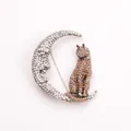 Eleganter silberner Mond und schillernde Strass-Katzenbrosche für Damen Accessoires - Mond und Katze