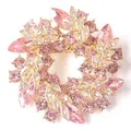 Elegante bloemenkrans broche met roze strass en goudkleurige finish voor dames - Roze
