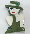 Elegant vintage acrylic lady brooch featuring a green hat and gown for fashion accessories - Green Dress Girl Style (R5-2-7818)