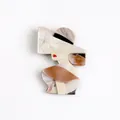 Elegant modern lady wearing a large hat acrylic brooch with marbled brown and cream finish - Deep and Light Coffee