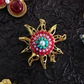 Detailed macro shot of vintage gold sun goddess brooch with colorful beads and pearl - Eight-Pointed Star Baroque (07)