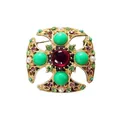 Detailed view of vintage Baroque hollow square brooch with emerald green stones - V016