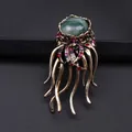 Elegant vintage gold jellyfish brooch featuring a large green oval stone and rhinestones - Vintage Green Stone Jellyfish (I9-6-3895)