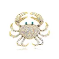 Sparkling gold-toned crab brooch encrusted with iridescent rhinestones and green eyes - Iridescent White Crab (I3-2-3299)