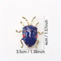Blauwe en gouden kever insectenbroche met rode stippen, afmetingen 4 cm bij 3,5 cm - Diepblauwe Scarabee (k5-6-2577)