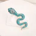 Vintage emaille slangenbroche in groenblauw met fonkelende blauwe strass in goud - Stijl 9 (Teal Emaille Ster)