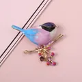 Geëmailleerde vogelbroche met gekleurde strass-steentjes in blauw en paars verloop - Blauw en Paars Verloop Vogel (b2-4-5152)