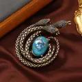 Vintage driekoppige slangenbroche met turquoise steen en blauwe ogen - Stijl 19 (Driekoppige Slang Blauwe Steen)