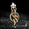 Luxe vintage goudkleurige slangenbroche met sprankelende strass en kristal - Stijl 25 (Grote Druppel Kristal)
