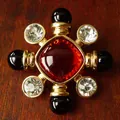 Detail view of vintage court style brooch with red center stone and black beads - Style C Radiating Star (4.8x4.8cm)
