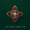 Detail view of baroque vintage gold cross brooch with colorful gemstones and pearl - Luxury Gold Cross Cabochon Gemstone Style (5089421201397)