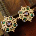 Close-up of vintage court-style brooches with colorful crystals on wood background - Earring 3 (3.3x3.3cm)