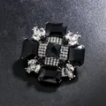 Broche vintage de estilo británico con cristal negro y diamantes de imitación. - Negro